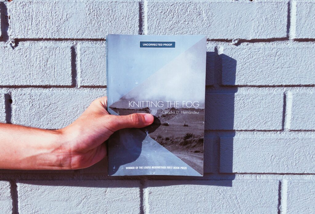 This is an Independent Book Review original photo of the paperback copy of Knitting the Fog  by Claudia Sanchez